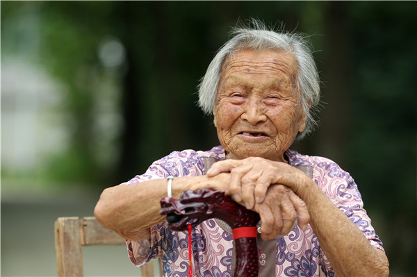 98岁老党员汪明: 用坚强肩膀筑起"妇联坝"